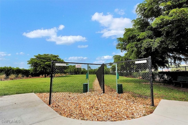 view of home's community with a lawn