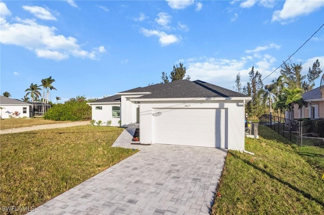 ranch-style home with a garage, a front lawn, decorative driveway, and stucco siding