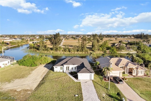 aerial view featuring a water view and a residential view