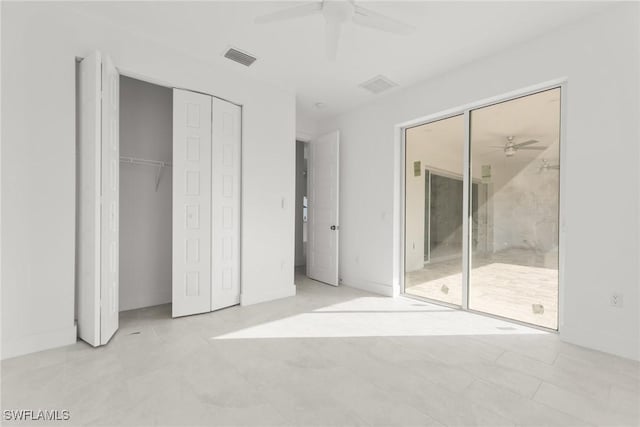 unfurnished bedroom featuring ceiling fan