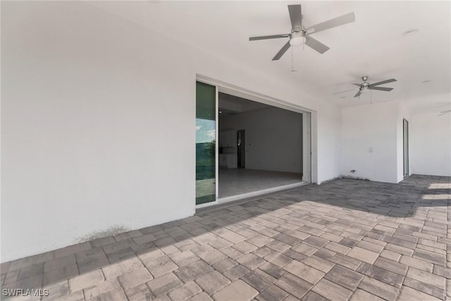 view of patio with ceiling fan