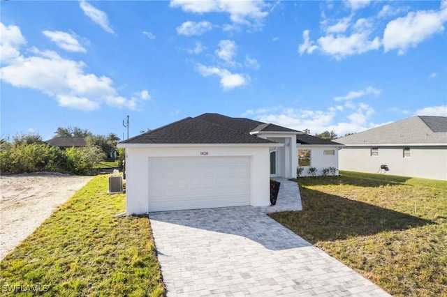 ranch-style house featuring cooling unit, a garage, decorative driveway, stucco siding, and a front lawn