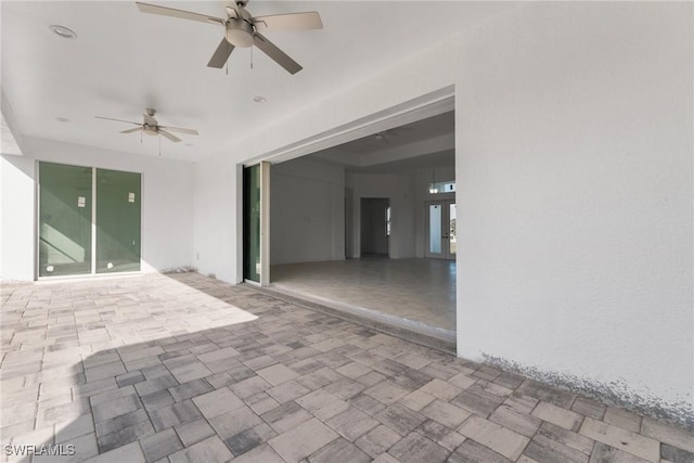 view of patio with ceiling fan