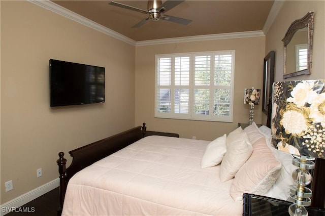 bedroom featuring hardwood / wood-style flooring, ornamental molding, and ceiling fan