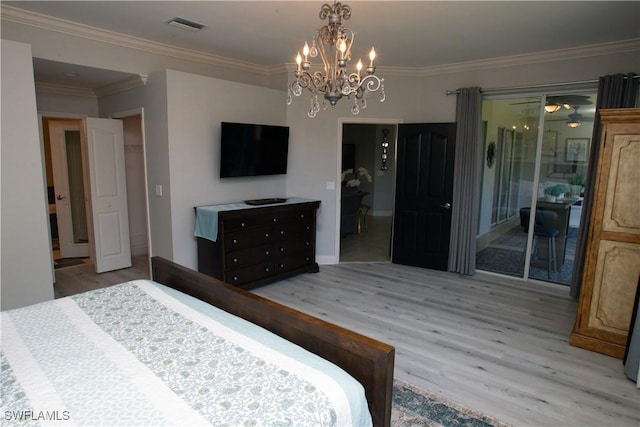 bedroom featuring an inviting chandelier, ornamental molding, access to exterior, and light hardwood / wood-style floors