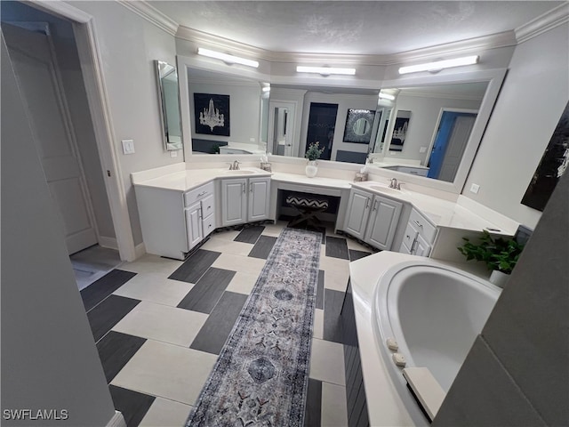 bathroom featuring tiled tub, vanity, and crown molding