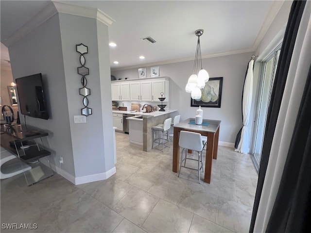 dining area with crown molding