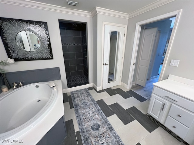 bathroom featuring crown molding, vanity, and independent shower and bath