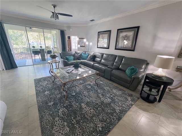 living room featuring light tile patterned floors, ornamental molding, and ceiling fan