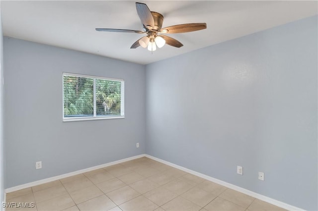 unfurnished room featuring ceiling fan and light tile patterned floors