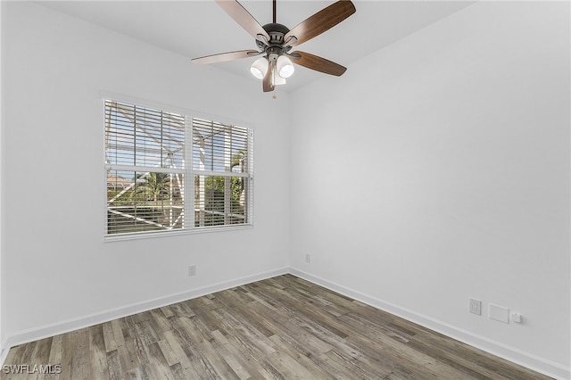 unfurnished room featuring ceiling fan and hardwood / wood-style flooring