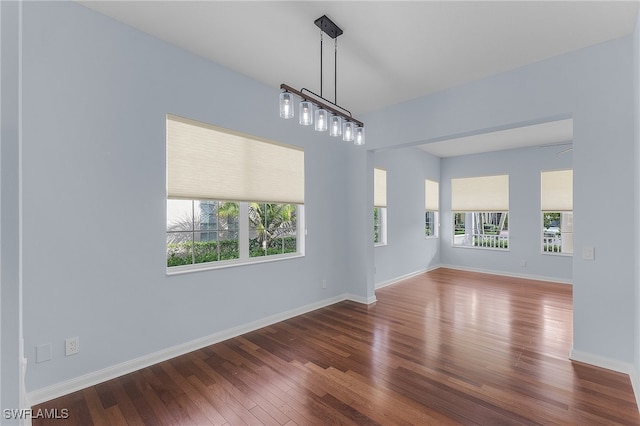 spare room featuring hardwood / wood-style flooring