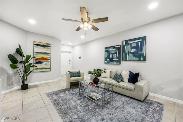 tiled living room with ceiling fan