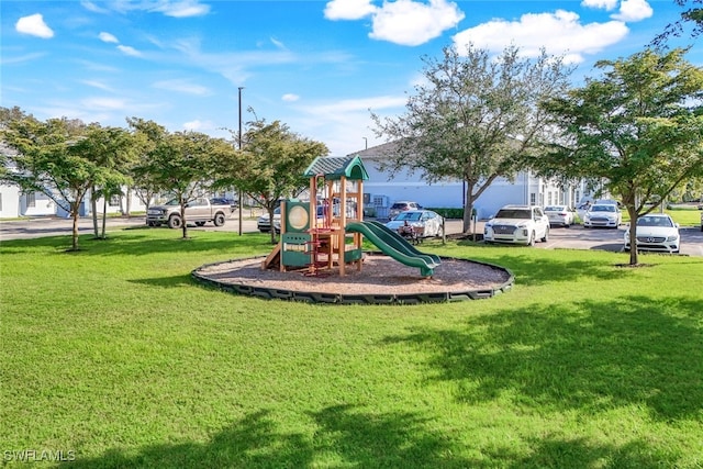 view of playground with a yard