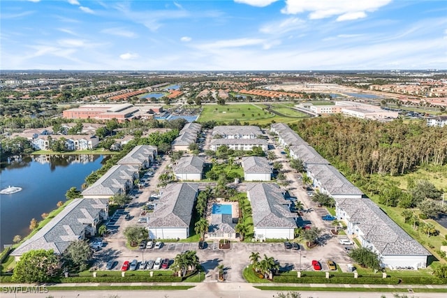 birds eye view of property featuring a water view