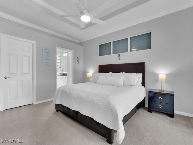 carpeted bedroom with ceiling fan, crown molding, and connected bathroom