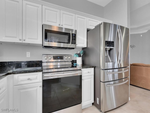 kitchen featuring white cabinetry and stainless steel appliances