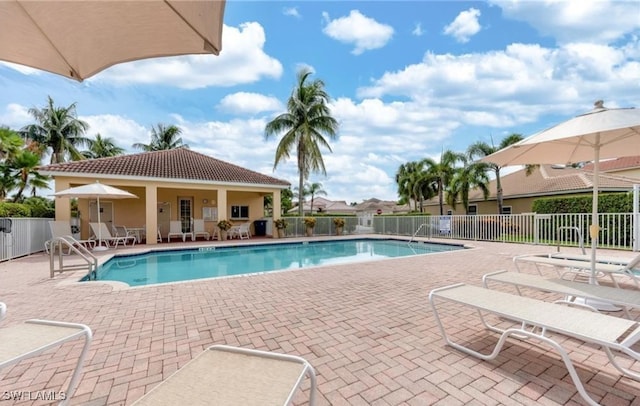 view of swimming pool featuring a patio area