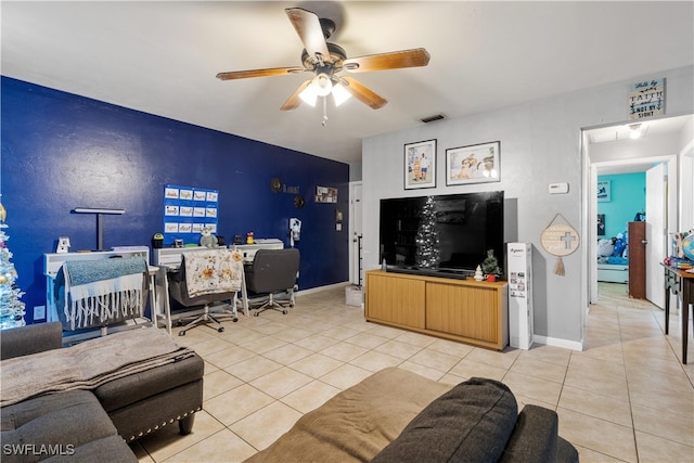 living room with light tile patterned floors and ceiling fan