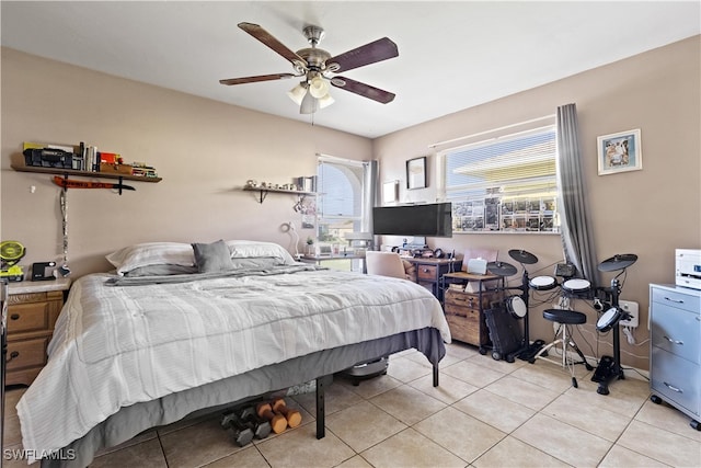 bedroom featuring ceiling fan and light tile patterned floors