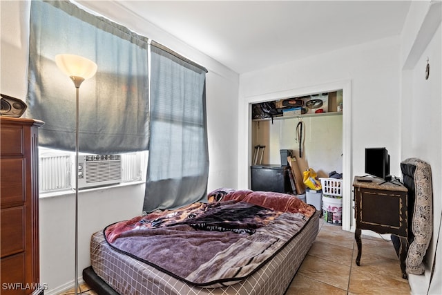 tiled bedroom featuring cooling unit