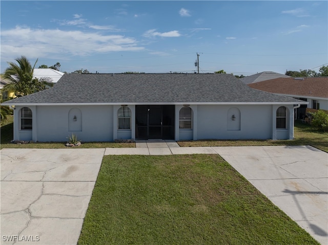 view of front of property with a front lawn