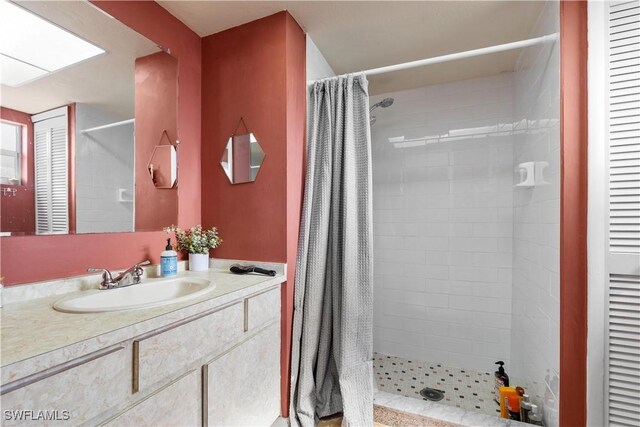 bathroom featuring vanity and walk in shower