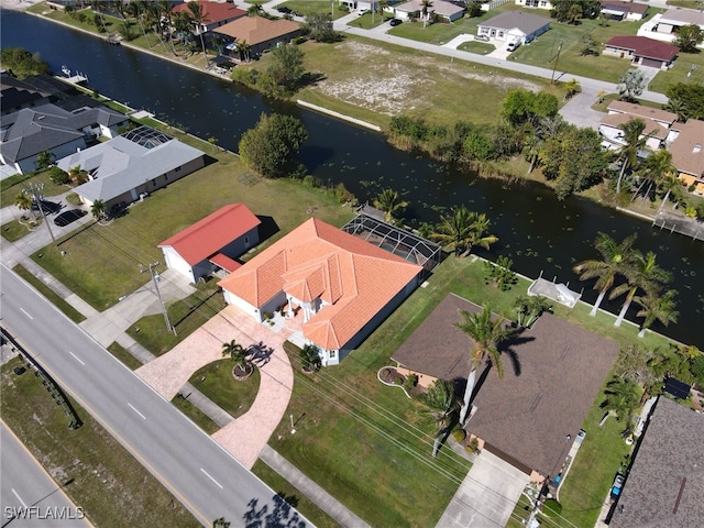 drone / aerial view featuring a water view