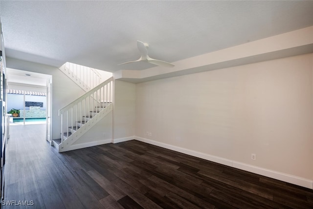 interior space featuring dark hardwood / wood-style floors and ceiling fan