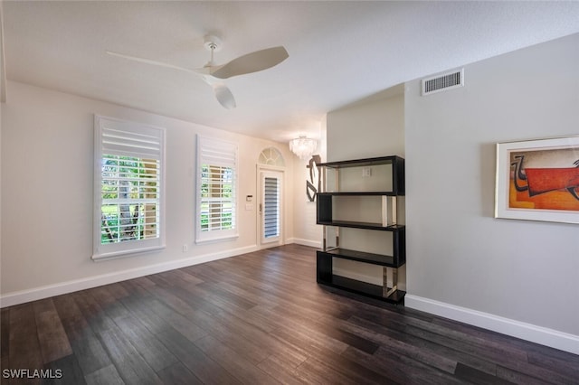 interior space featuring dark hardwood / wood-style floors and ceiling fan