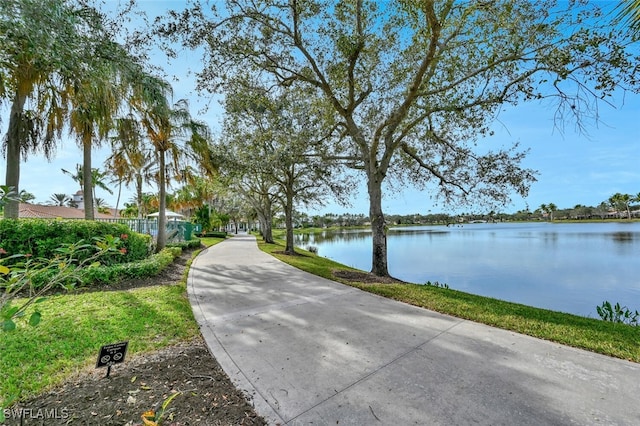 view of home's community with a water view