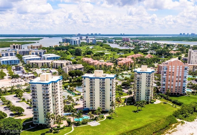 birds eye view of property with a water view