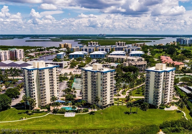 birds eye view of property featuring a water view