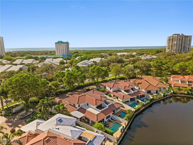 drone / aerial view with a water view