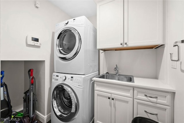 5908 Via Lugano, Naples, FL 34108 - clothes washing area with stacked washer / drying machine and cabinet space