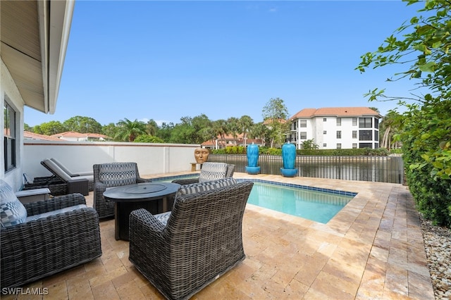 view of pool featuring a patio