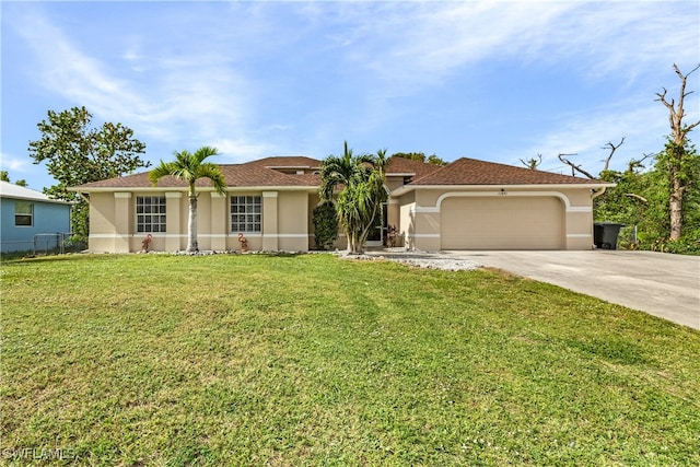 view of front facade featuring a front yard and a garage