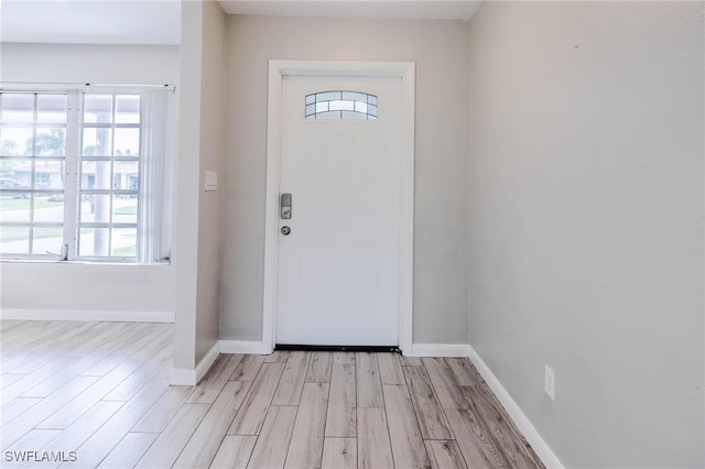 foyer entrance featuring light hardwood / wood-style floors