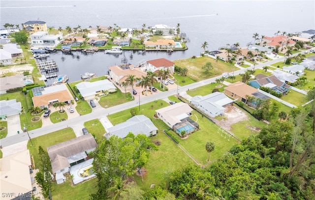 bird's eye view with a water view