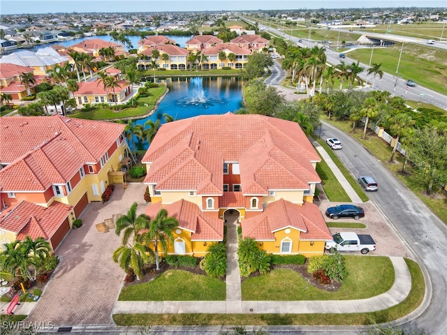 drone / aerial view with a water view