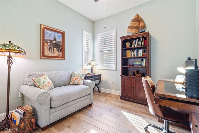 office space with light hardwood / wood-style floors