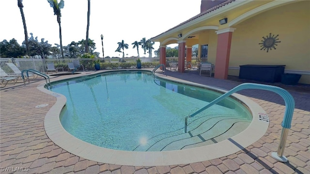 view of pool featuring a patio