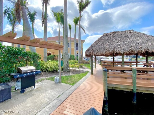 dock area with a gazebo and a pergola