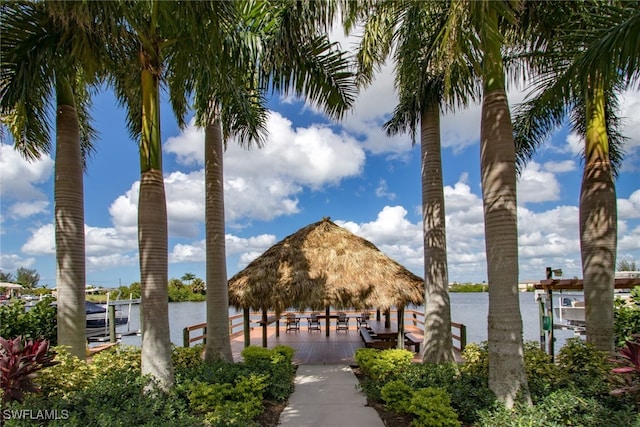 view of community featuring a water and mountain view and a gazebo