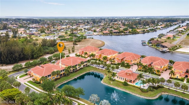 bird's eye view with a water view