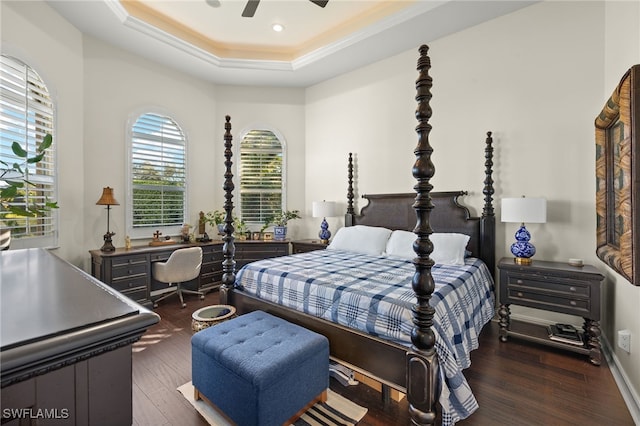 12656 Grandezza Cir, Estero, FL 33928 - bedroom with a tray ceiling, wood finished floors, crown molding, a desk, and ceiling fan