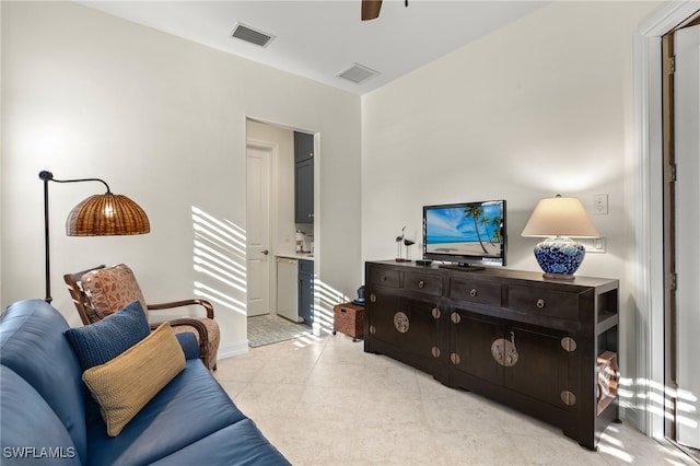 12656 Grandezza Cir, Estero, FL 33928 - living area with ceiling fan and light tile patterned floors