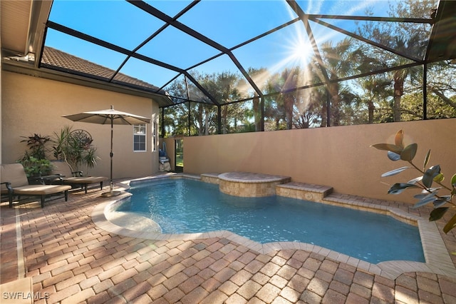 view of swimming pool with a patio and glass enclosure