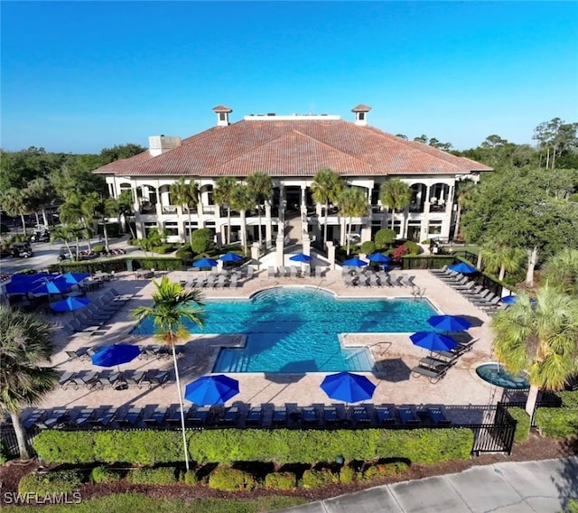 view of swimming pool featuring a patio area