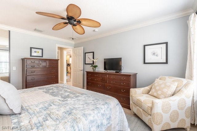 bedroom with ceiling fan and crown molding